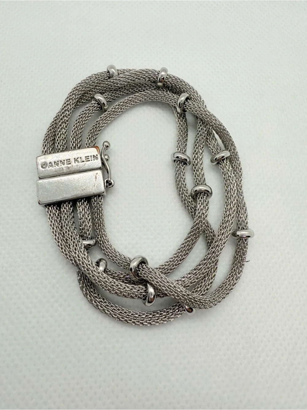 Anne Klein Silver Layered Mesh Bracelet with Polished Rings